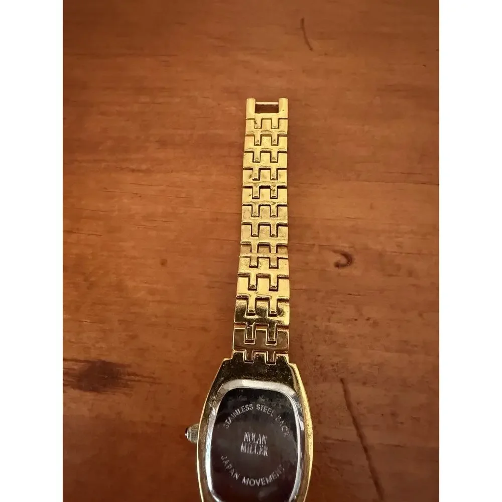 Nolan Miller Glamour Collection Crystal Gold Tone Bracelet Watch Mother Of Pearl